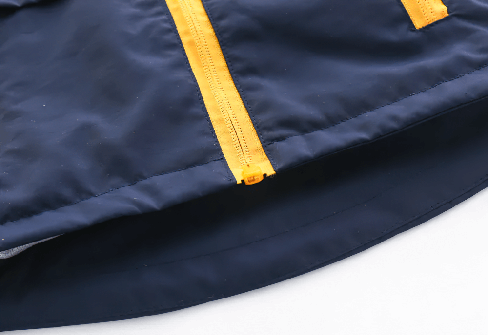 Close-up view of Hooded Windbreaker Jacket with Zip Front - SF3602 in navy with yellow zipper, showing detail of lightweight fabric and design.