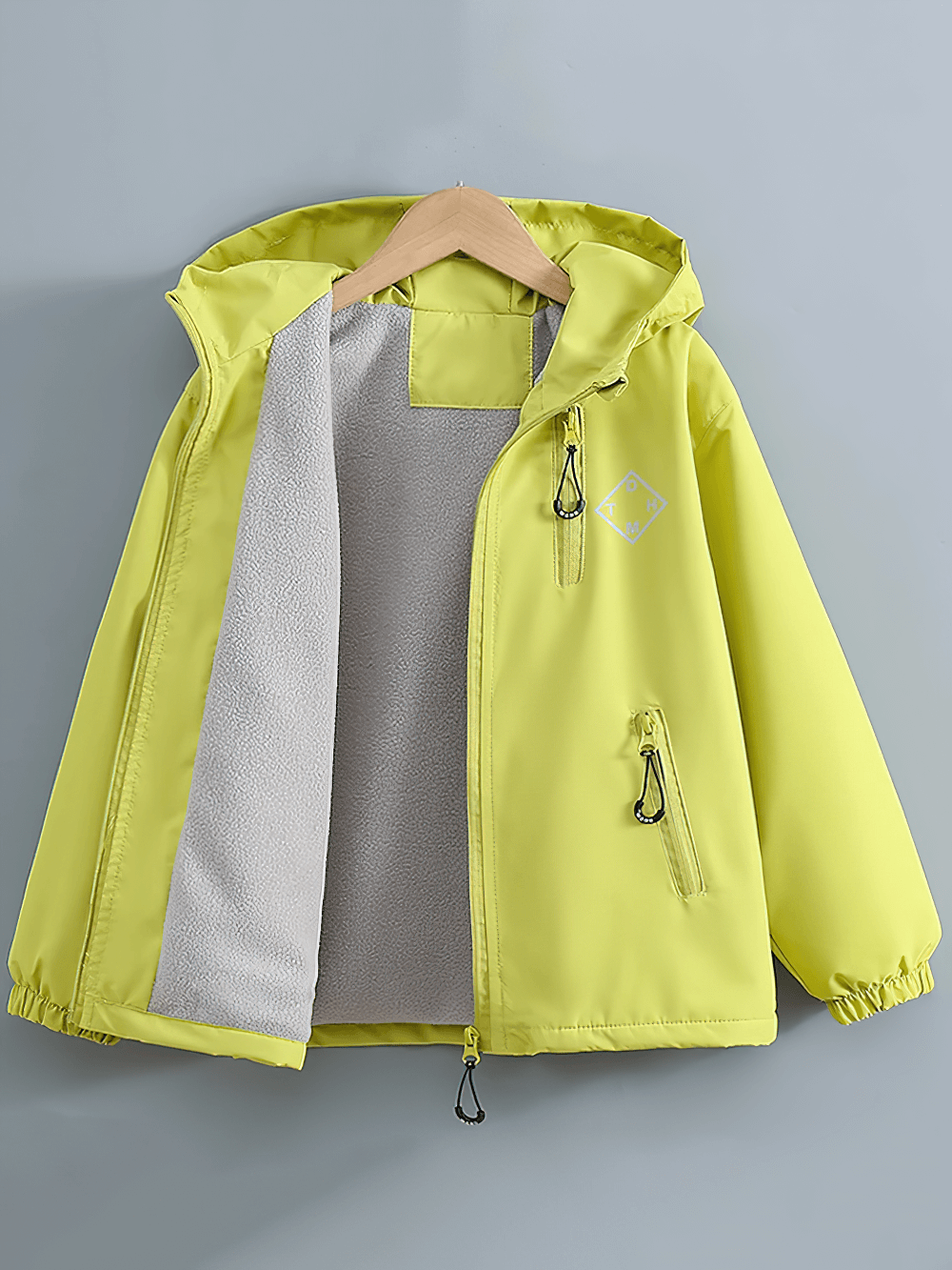 Hooded Windproof and Waterproof Outdoor Jacket - SF3563 for kids, shown open, highlighting plush lining and durable zippers in vibrant yellow.