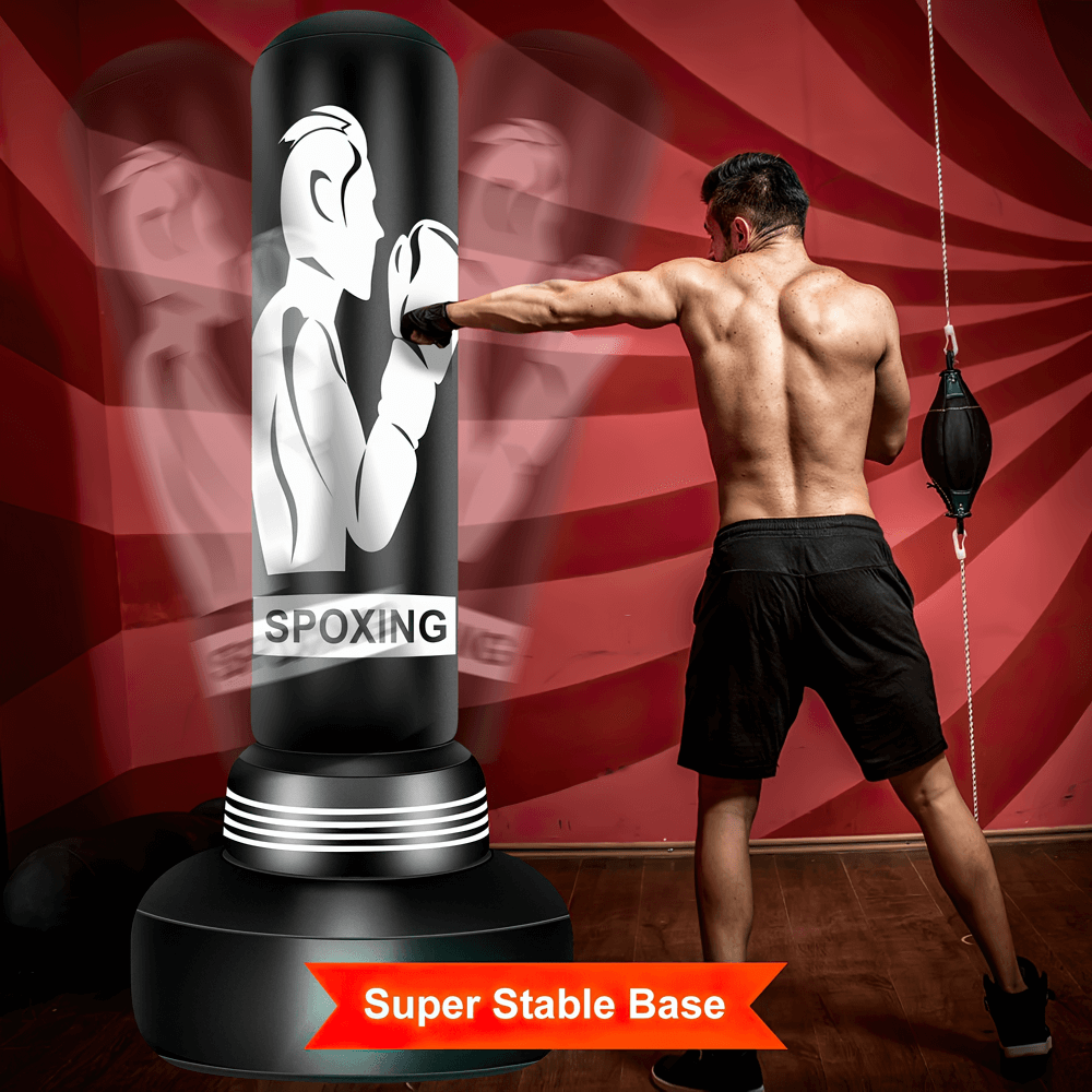 Man training with inflatable freestanding boxing bag SF2729, featuring stable base, boxing gloves, and electric air pump.