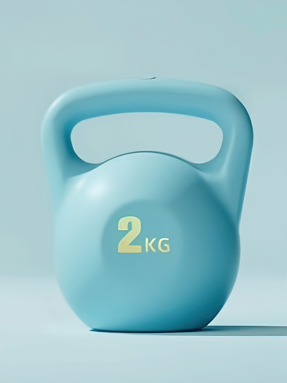 Blue ergonomic kettlebell for home and gym workouts, 2kg weight, soft exterior with secure grip, perfect for strength training.