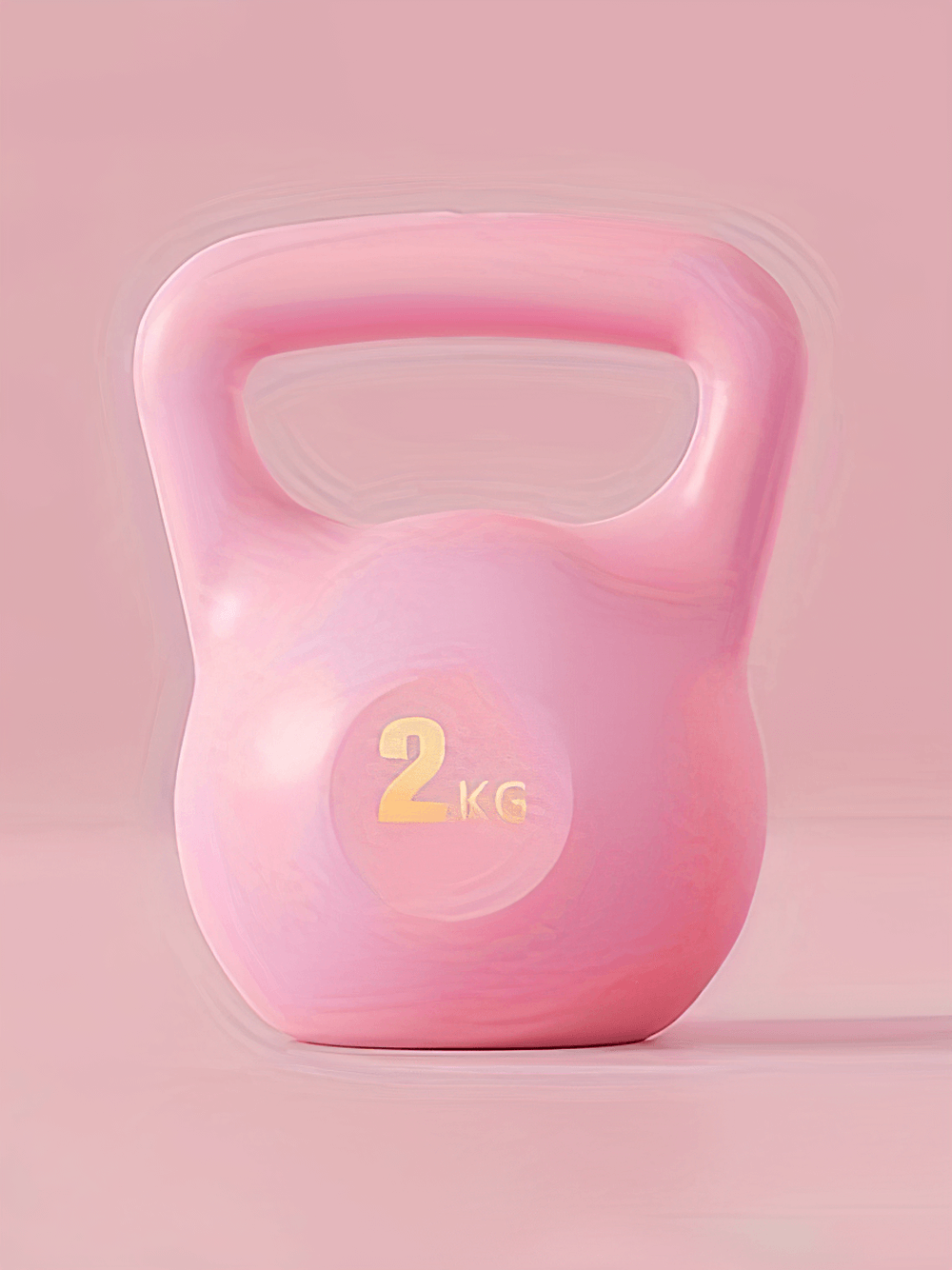 Pink 2kg kettlebell with ergonomic grip for home and gym workouts, featuring a soft, impact-resistant design for safe exercise.