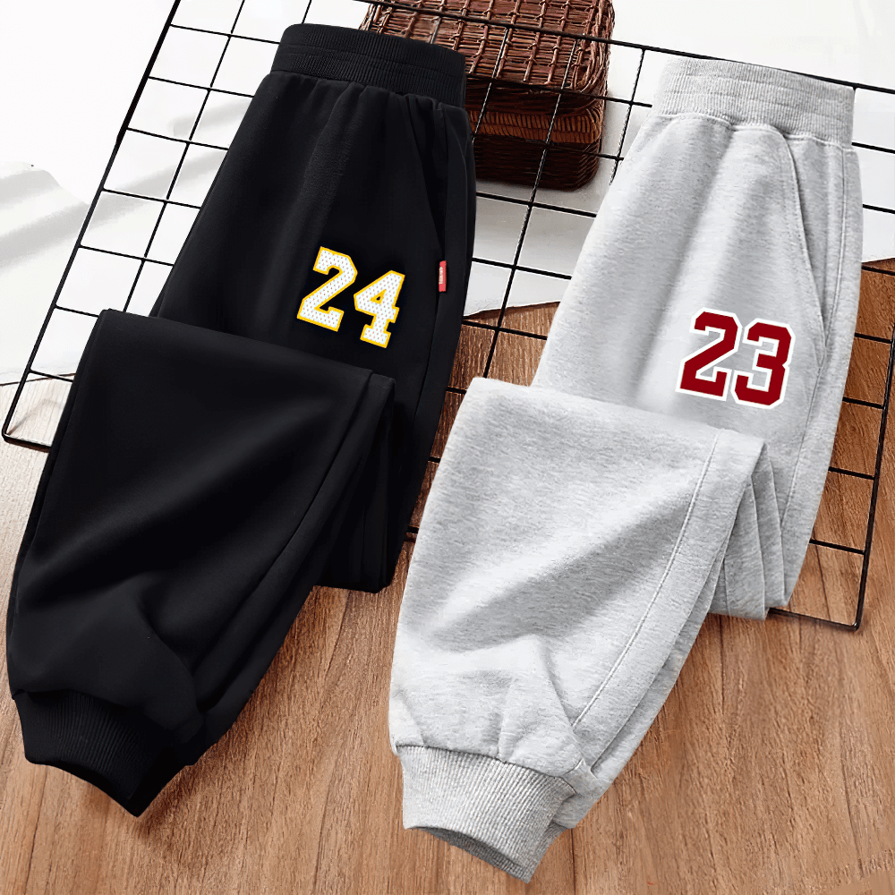 Kid's Basketball Number Long Sport Pants - SF3572, black and grey sweatpants with number prints for boys and girls, laid out on a grid.
