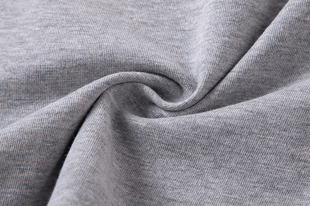 Close-up of soft grey cotton fabric used in Kids Basic Elastic Waistband Cotton Shorts - SF3820, showcasing comfort and quality material.