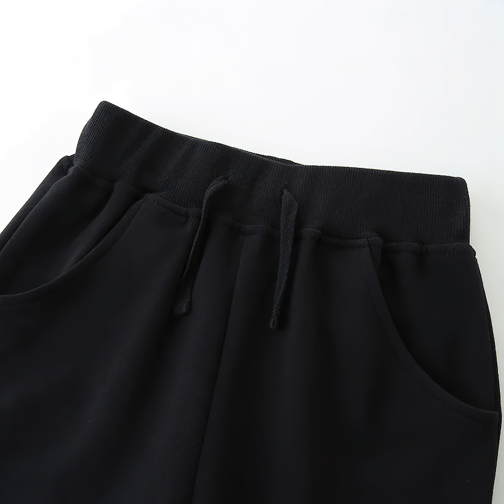 Kids' Black Shorts with Pockets and Elastic Waist - SF3825 showing elastic waistband and pockets.