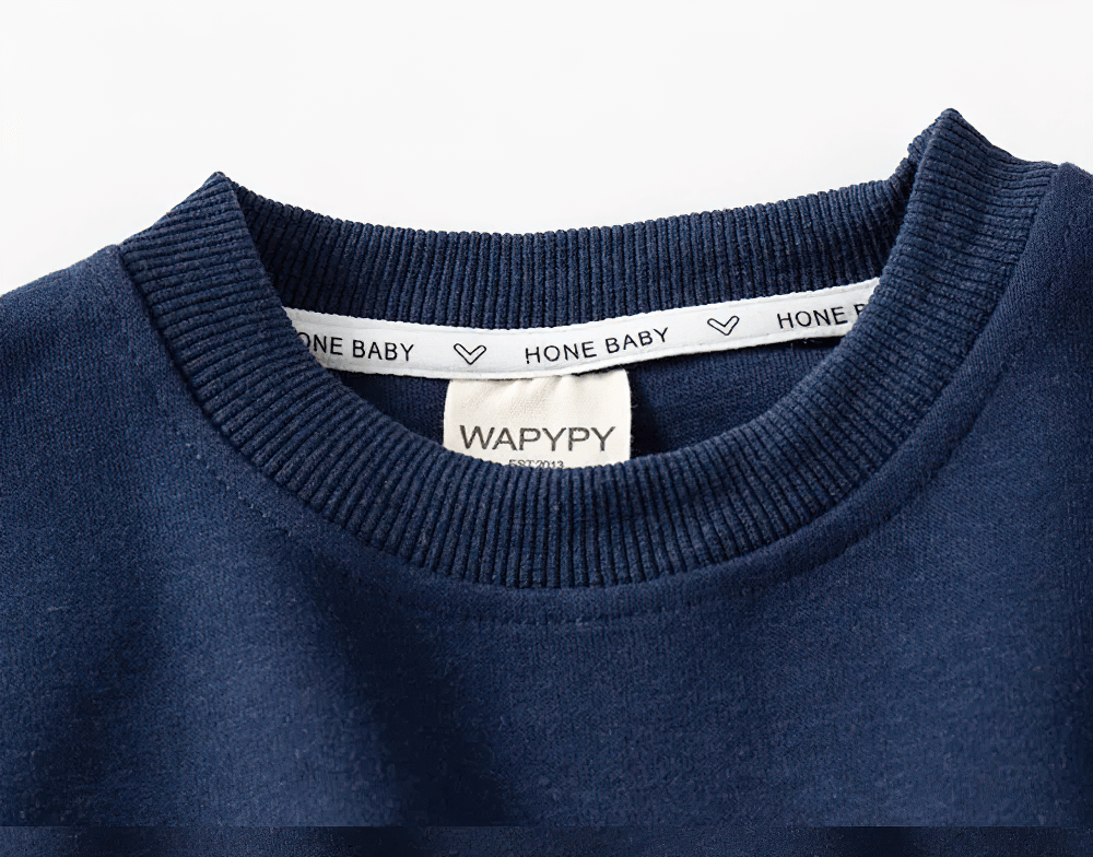 Close-up of Kid's Casual Detachment Semester Sweatshirt collar, featuring navy cotton fabric and branded inner label, style SF3094