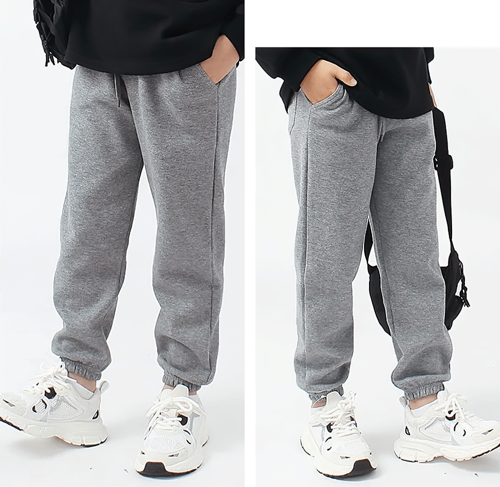 Kids Casual Sports Jogger Pants with Pockets - SF3612 in gray with white sneakers, featuring elastic waistband and stylish stitching. Ideal for active kids.