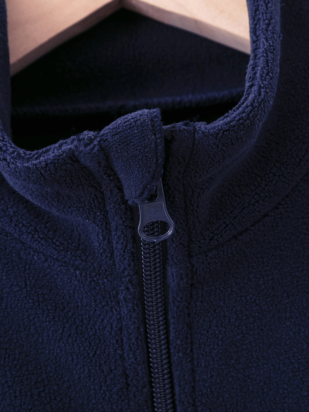 Close-up of navy Kids Color Block Fleece Jacket with Stand Collar - SF3858 showcasing the full zip front and soft fleece texture.