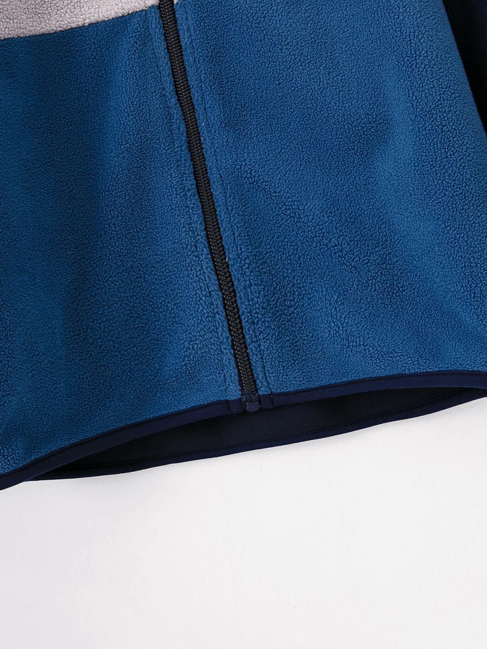 Close-up of Kids Color Block Fleece Jacket with Stand Collar - SF3858 featuring blue fleece panels and full front zipper.