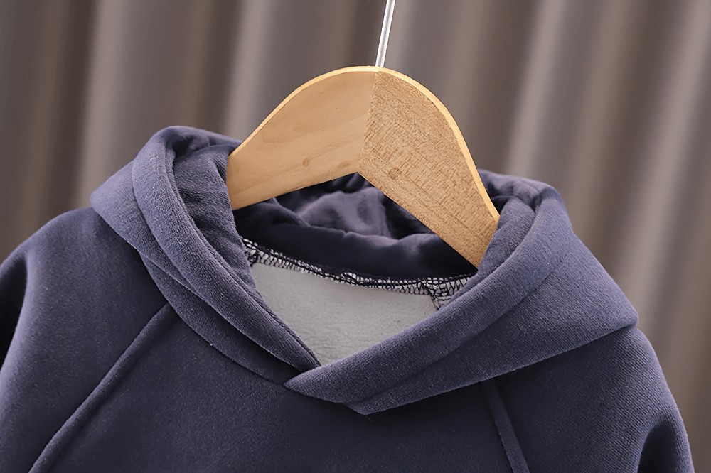 Kids Cozy Hoodie with Cute Horn Detail - SF3764 hanging on wooden hanger, soft fabric close-up, perfect toddler pullover for everyday wear.