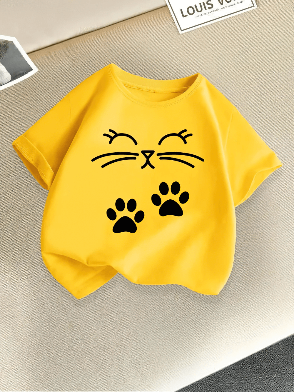 Kids Cute Cat Print Short-Sleeved T-Shirt - SF3867 with cartoon kitty face and paw print graphic on a yellow background.