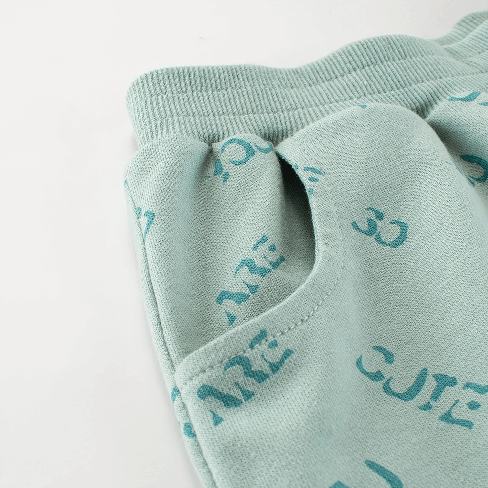 Close-up of Kids' Cute Print Soft Knit Shorts for Sport - SF3786 with graphic print and side pocket detail.
