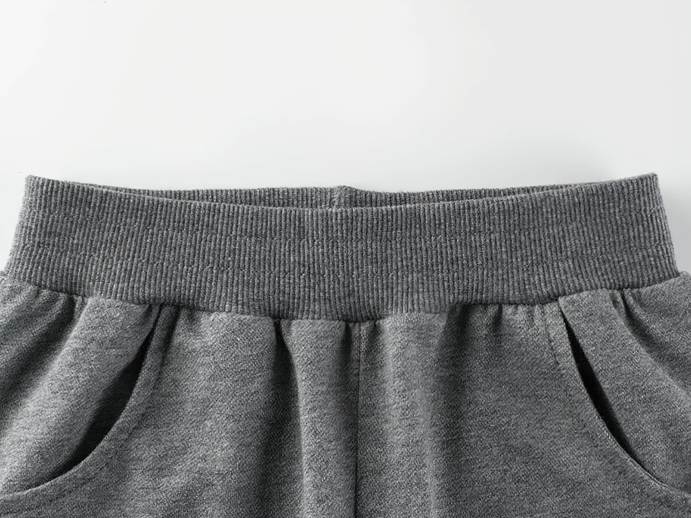 Close-up of elastic waist and pockets on Kids Dino Graphic Shorts for Active Boys - SF3787, showing soft fabric and practical design.