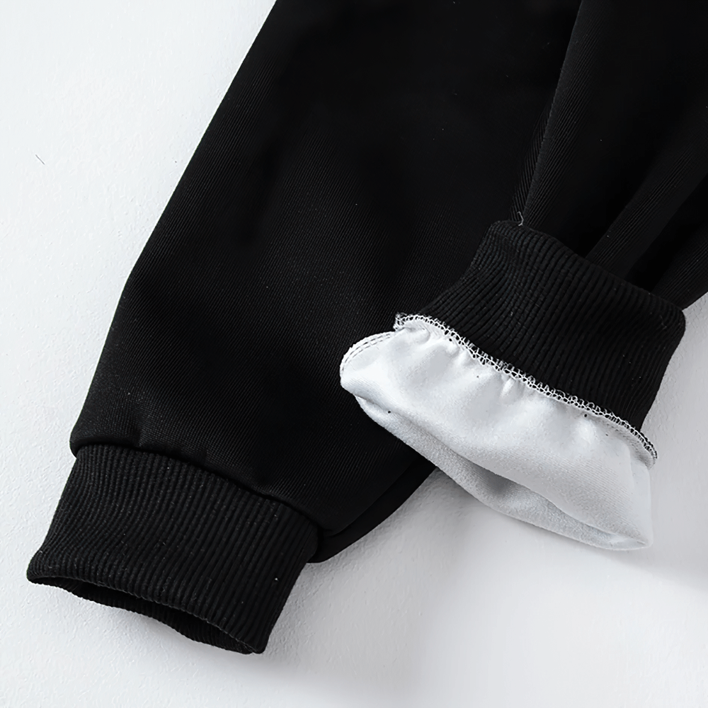 Close-up of Kids Elastic Ankle Sport Pants Ready Go Print - SF3880 showing black fabric and ribbed cuffs for boys and girls.