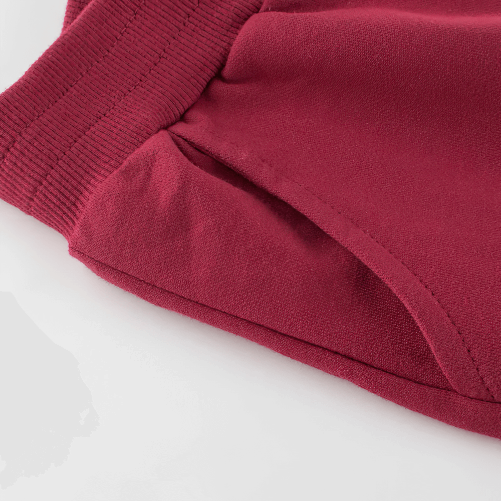 Close-up of Kids Elastic Waist Jogger Pants for Sport - SF3890 in red, featuring elastic waistband and tapered cuffs for active play.