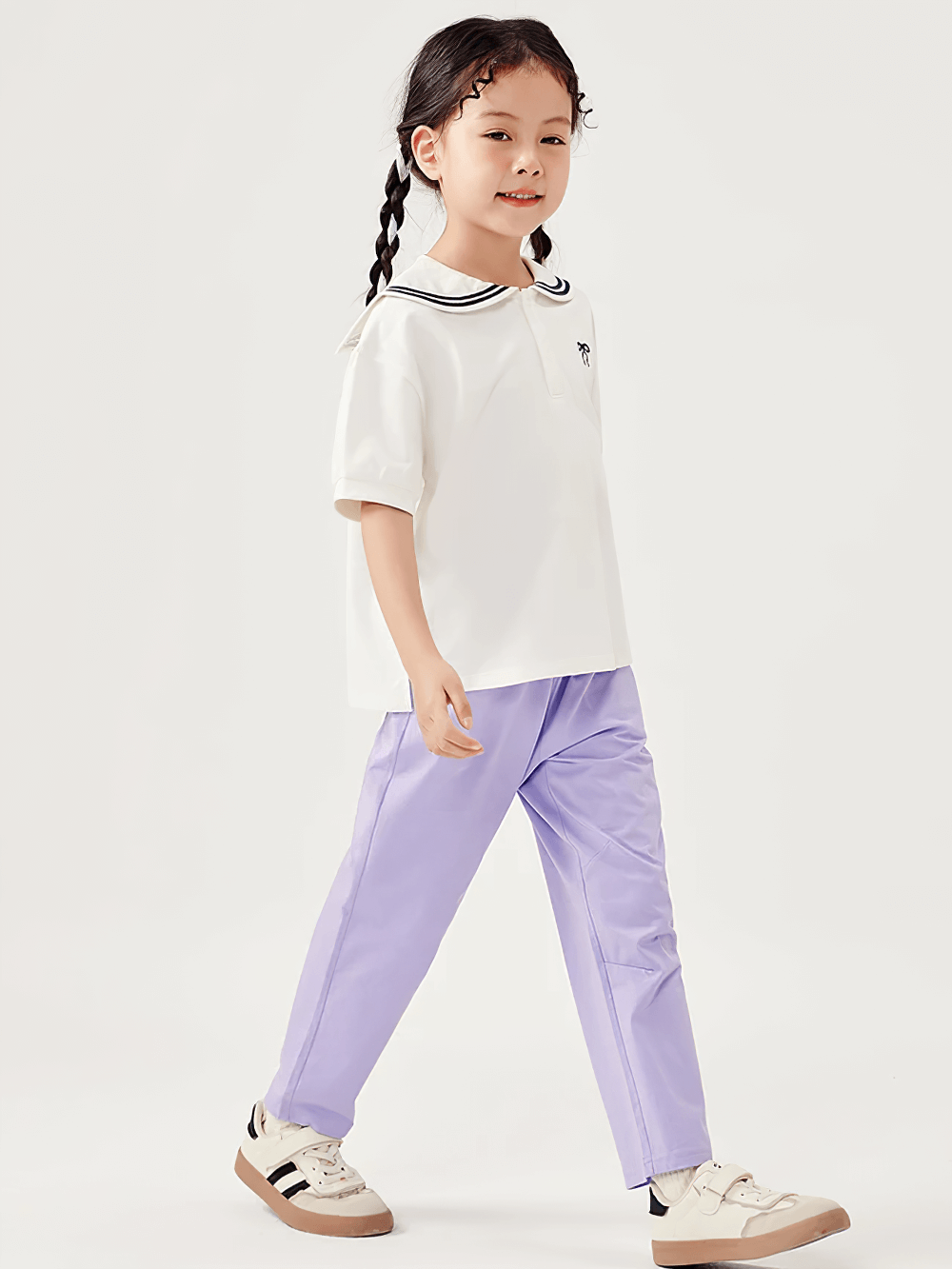Child wearing Kids Elastic Waist Soft Cotton Sport Pants - SF3800, showcasing lightweight daily wear in action.