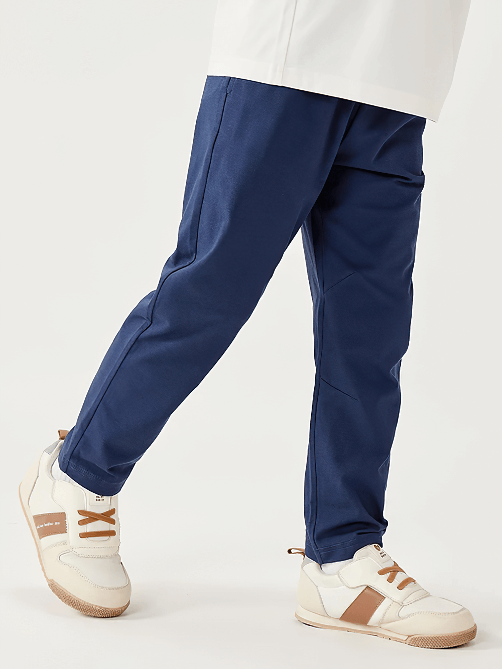 Child wearing Kids Elastic Waist Soft Cotton Sport Pants - SF3800 in navy blue, showcasing comfort and fit for active play.