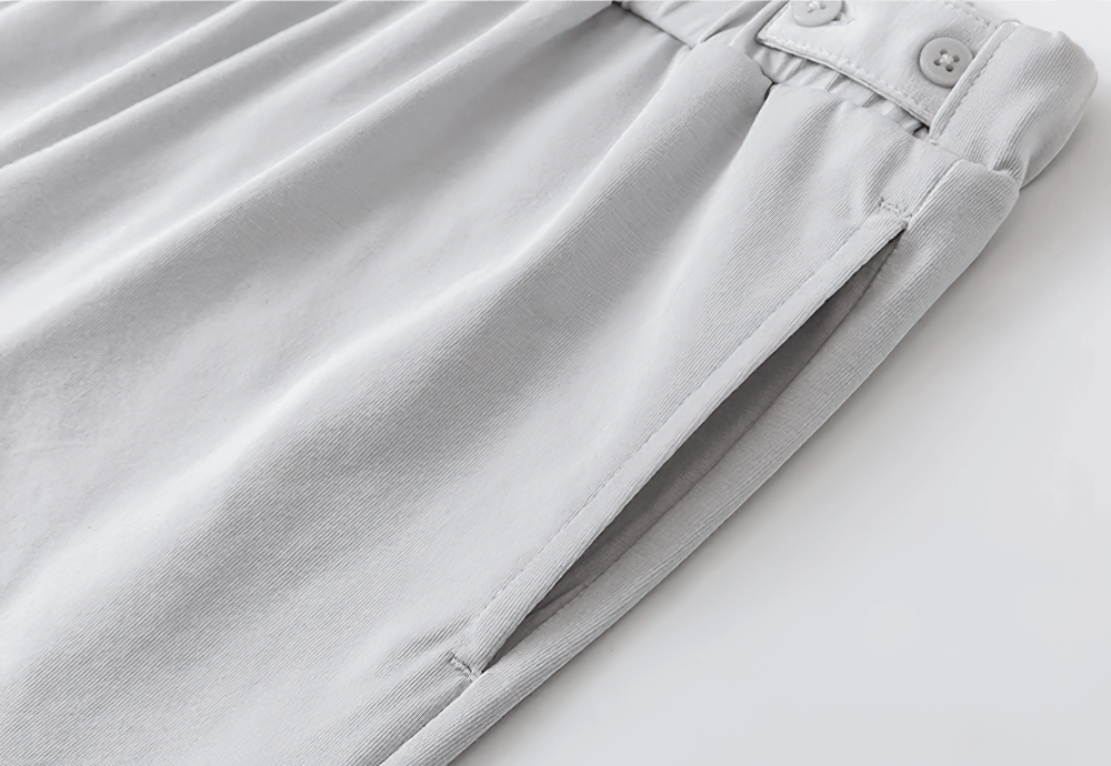 Close-up of Kids Elastic Waist Soft Cotton Sport Pants - SF3800 in light gray, showcasing the elegant straight-leg design and side pocket details.