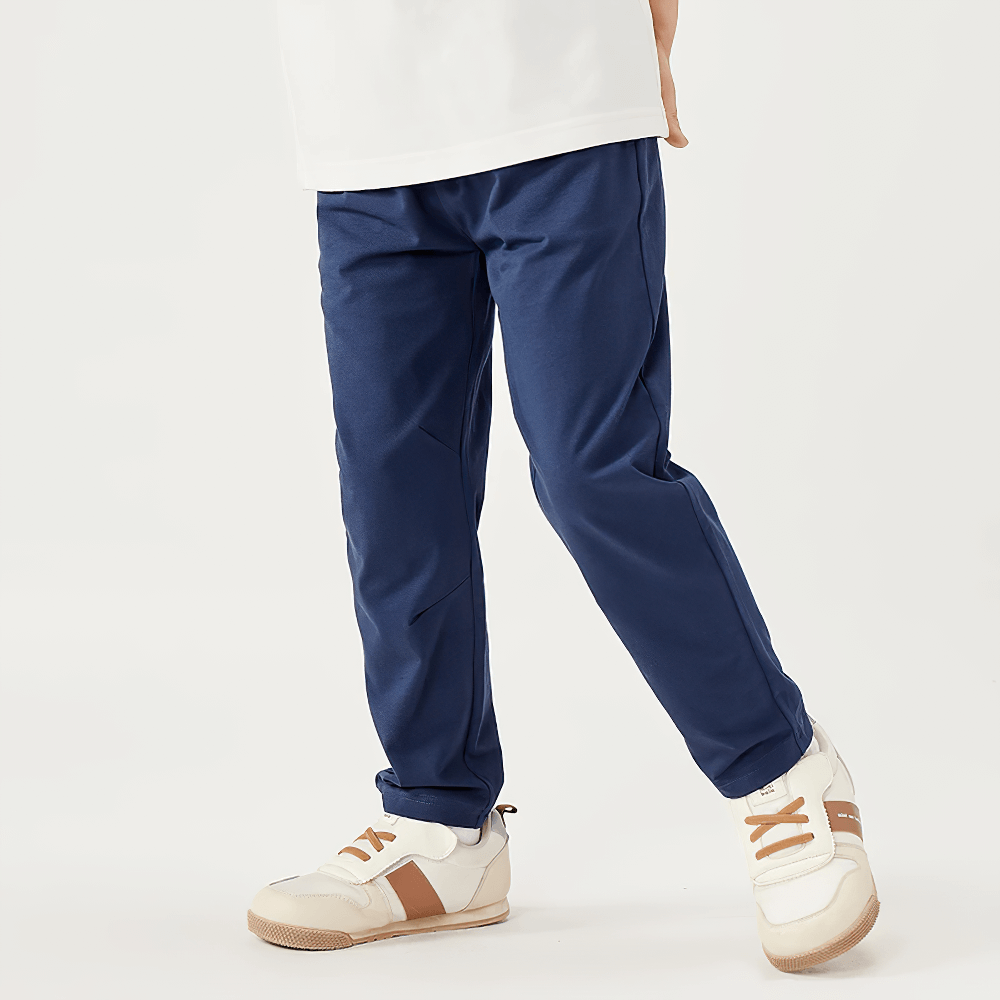 Young child wearing Kids Elastic Waist Soft Cotton Sport Pants - SF3800 in navy, showcasing comfort, stretch, and straight-leg style for play.