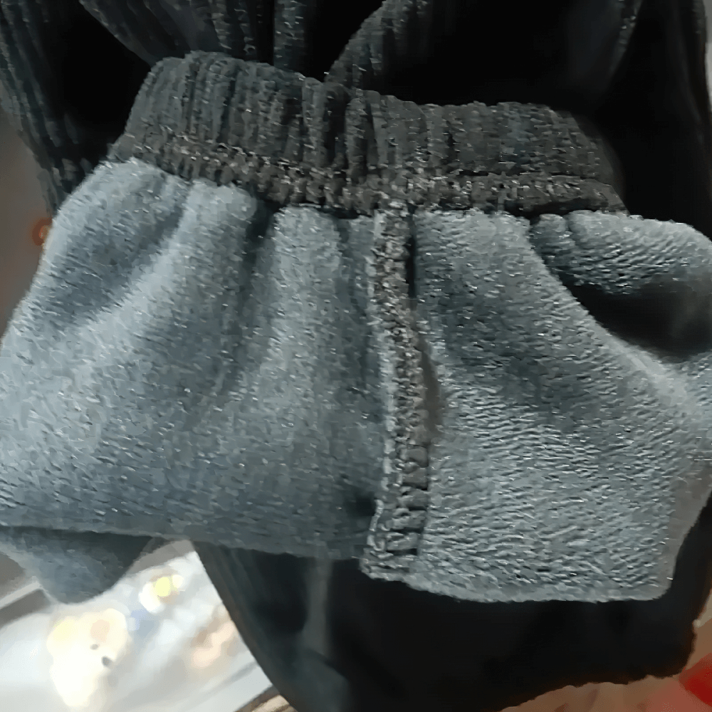 Close-up of Kids Fleece-Lined Sweatpants with Side Stripe - SF3717, showing elastic waist and warm fleece lining for comfort and warmth.