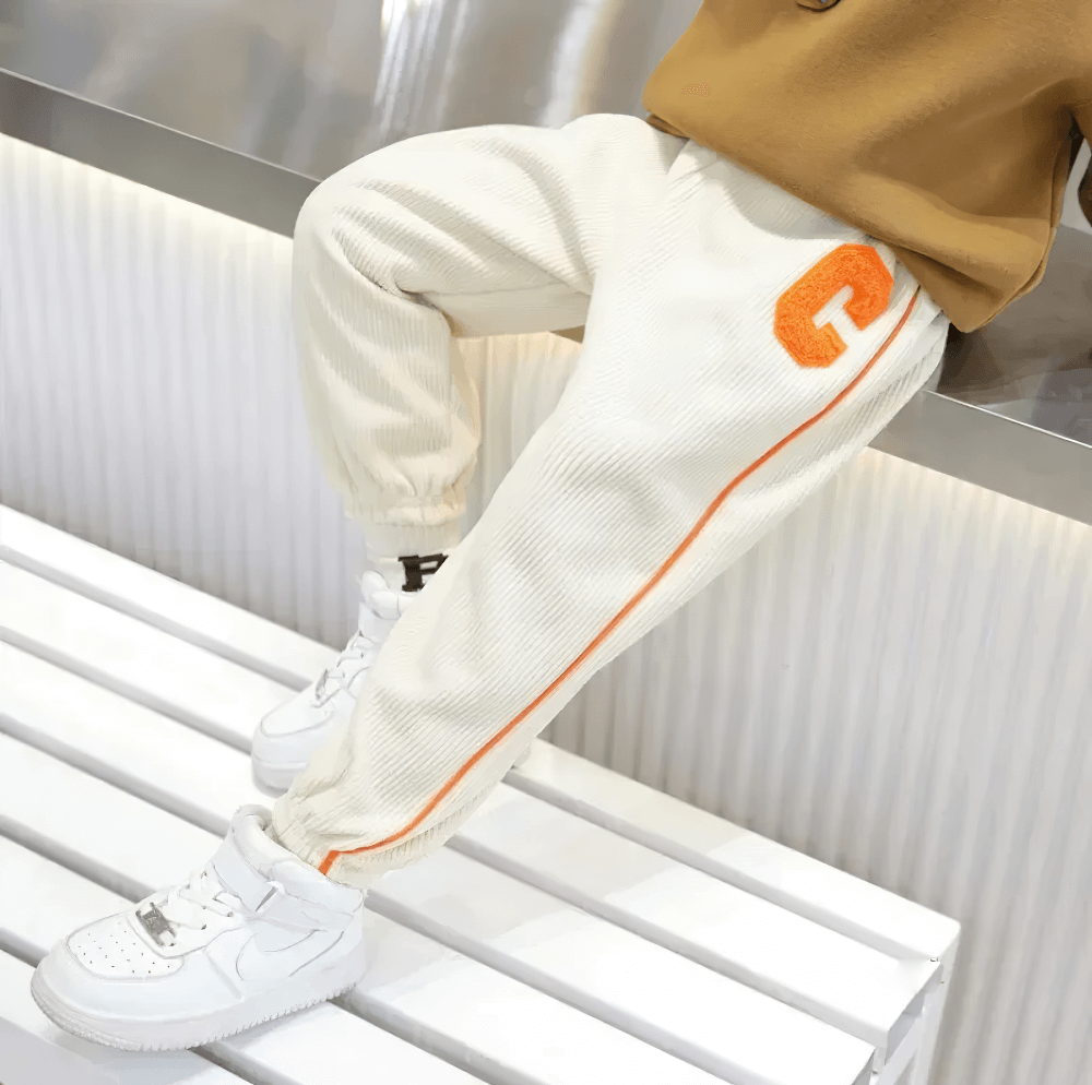 Kids Fleece-Lined Sweatpants with Side Stripe - SF3717 in white with orange stripe, showcasing elastic waist and sporty design.