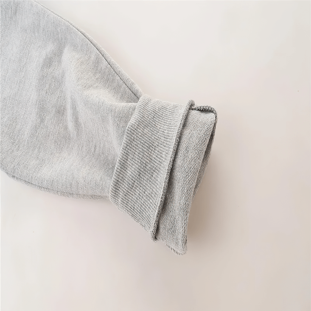 Close-up of Kids Fleece Pants with Drawstring and Rib Cuffs - SF3811, showcasing soft ribbed cuff in light grey.