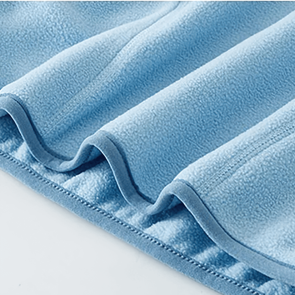 Close-up of fabric texture for Kids Fleece Sweatshirt with Half Zip Polckets - SF3578, showcasing soft and cozy fleece material.