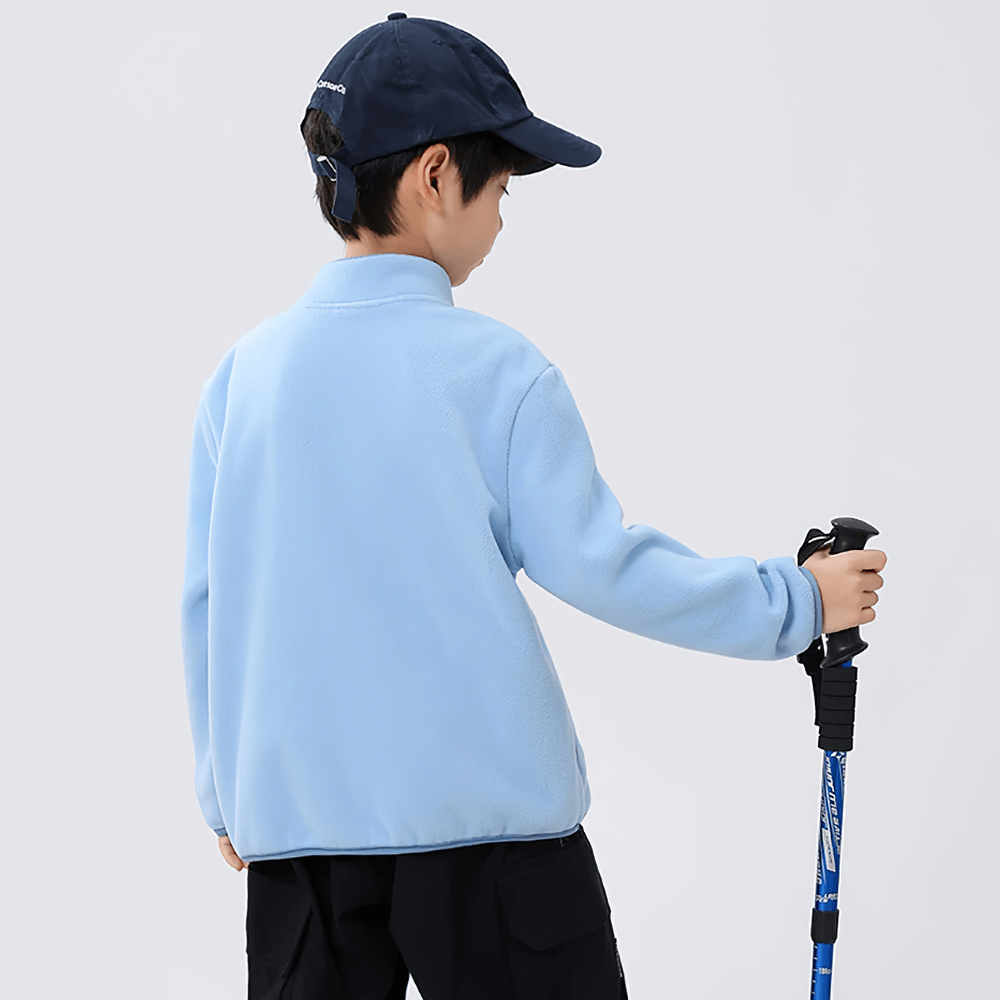 Child wearing Kids Fleece Sweatshirt with Half Zip Polckets - SF3578 in light blue outdoor gear
