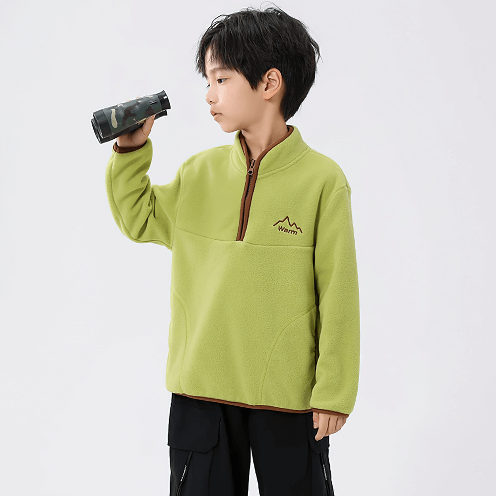 Young boy wearing Kids Fleece Sweatshirt with Half Zip Polckets - SF3578 in green, exploring with binoculars.