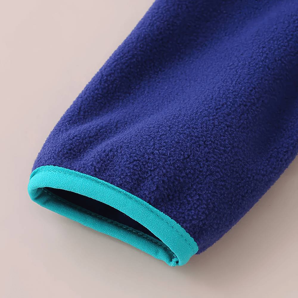Close-up of Kids Fleece Sweatshirt with Half Zip Polckets - SF3578, featuring vibrant blue fleece and teal detail on the sleeve.