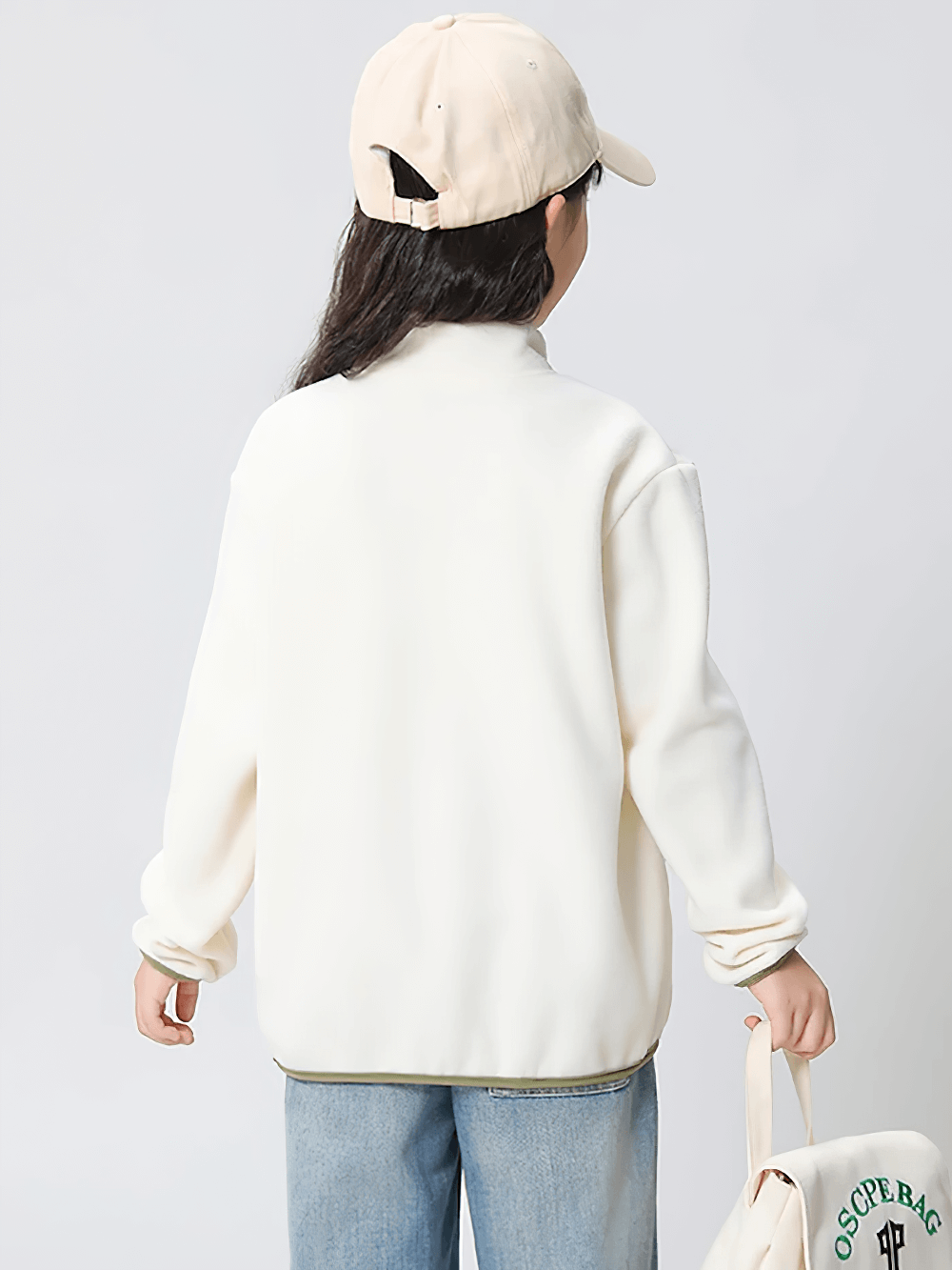Back view of child wearing white Kids Fleece Sweatshirt with Half Zip Polckets - SF3578 outdoors, showcasing casual and warm design.