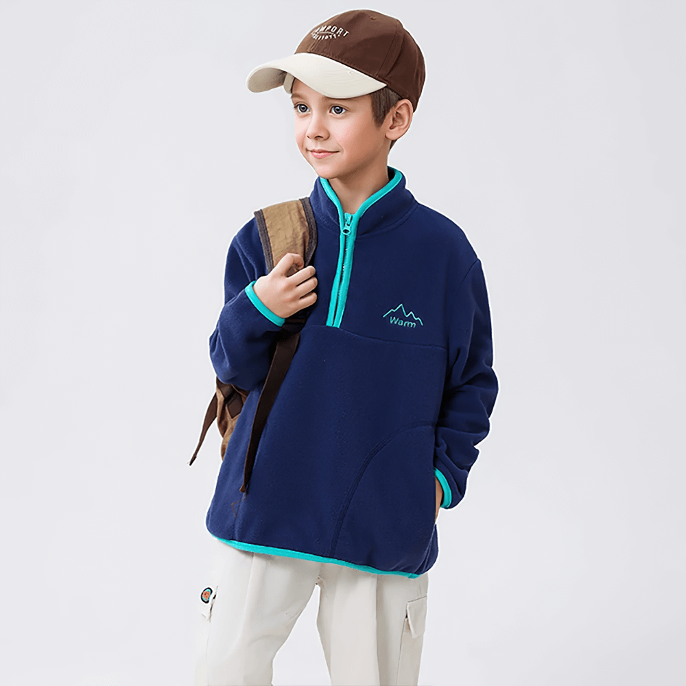 Young boy wearing Kids Fleece Sweatshirt with Half Zip Polckets - SF3578, navy color with mint accents, ready for outdoor adventures.