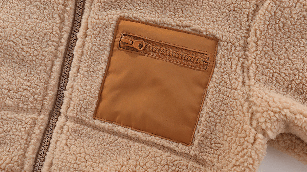 Close-up of Kids Fleece Zip Jacket with Contrast Pocket Design - SF3509, showcasing the textured sherpa fleece and chest pocket.