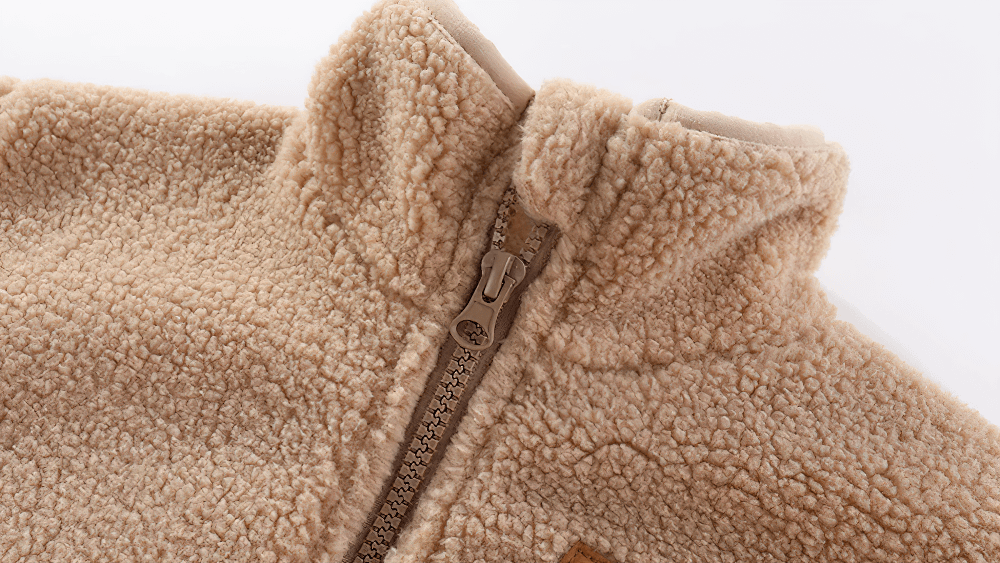 Close-up of Kids Fleece Zip Jacket with Contrast Pocket Design - SF3509 showing zipper and cozy sherpa fleece texture.