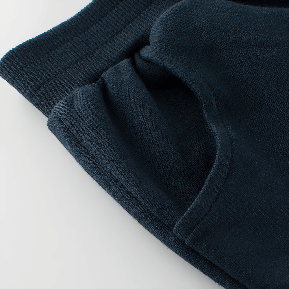 Close-up of the side pocket and elastic waistband on Kids G1 Graphic Knit Shorts - SF3785, highlighting soft fabric and sporty design.