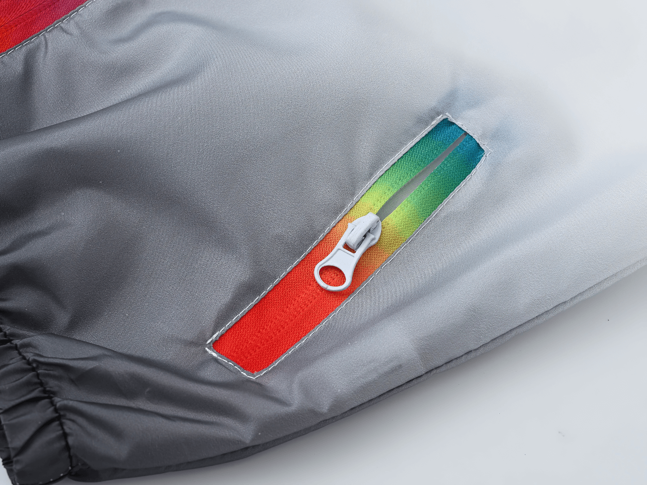 Close-up of Kids Gradient Hooded Jacket with Zipper and Pockets - SF3636 showing vibrant pocket zipper and smooth fabric.