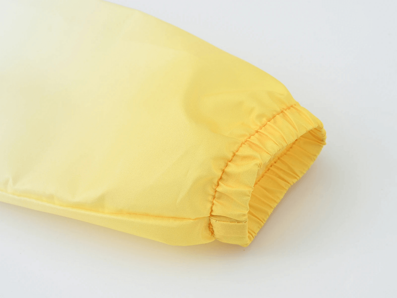 Yellow sleeve of Kids Gradient Hooded Windbreaker with Zipper - SF3652 showing elastic cuff detail.