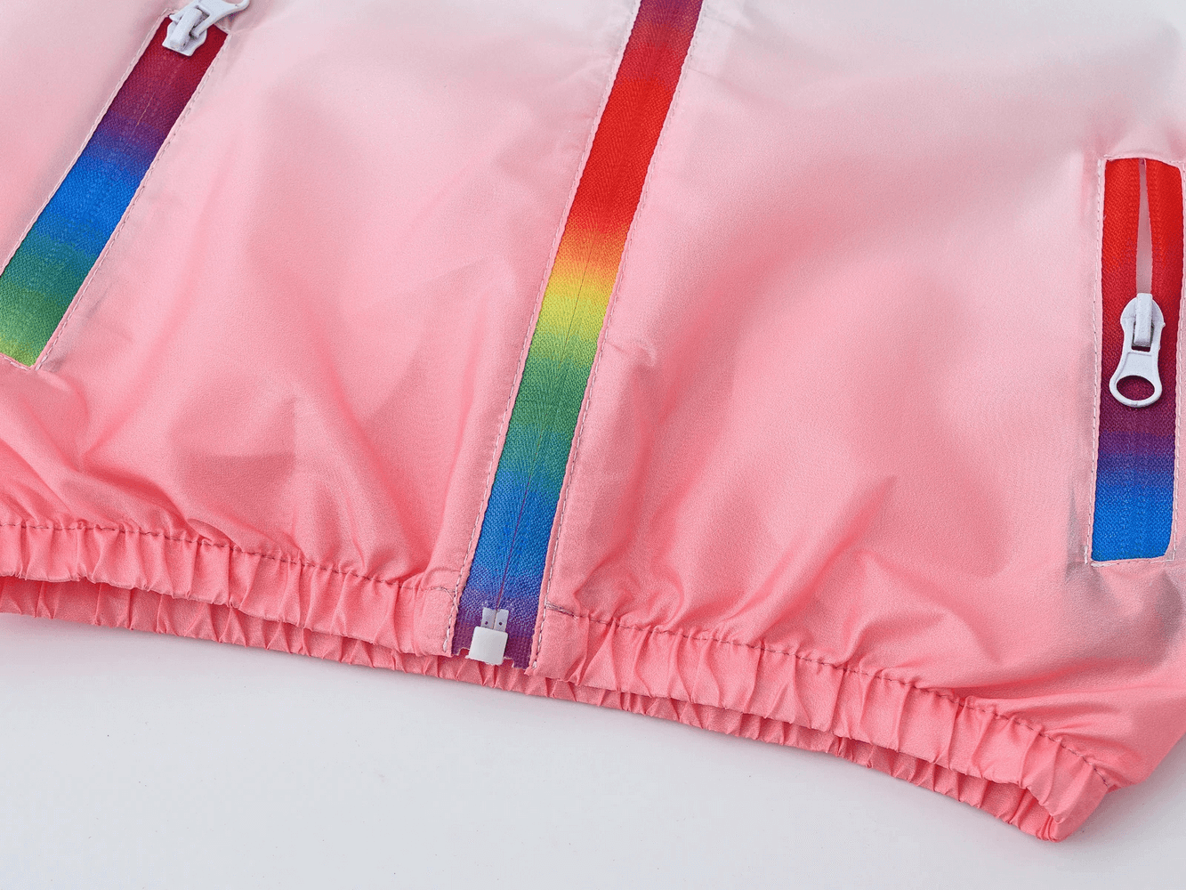 Close-up of Kids Gradient Hooded Windbreaker with Zipper - SF3652 showing gradient zipper design and pink ombre fabric