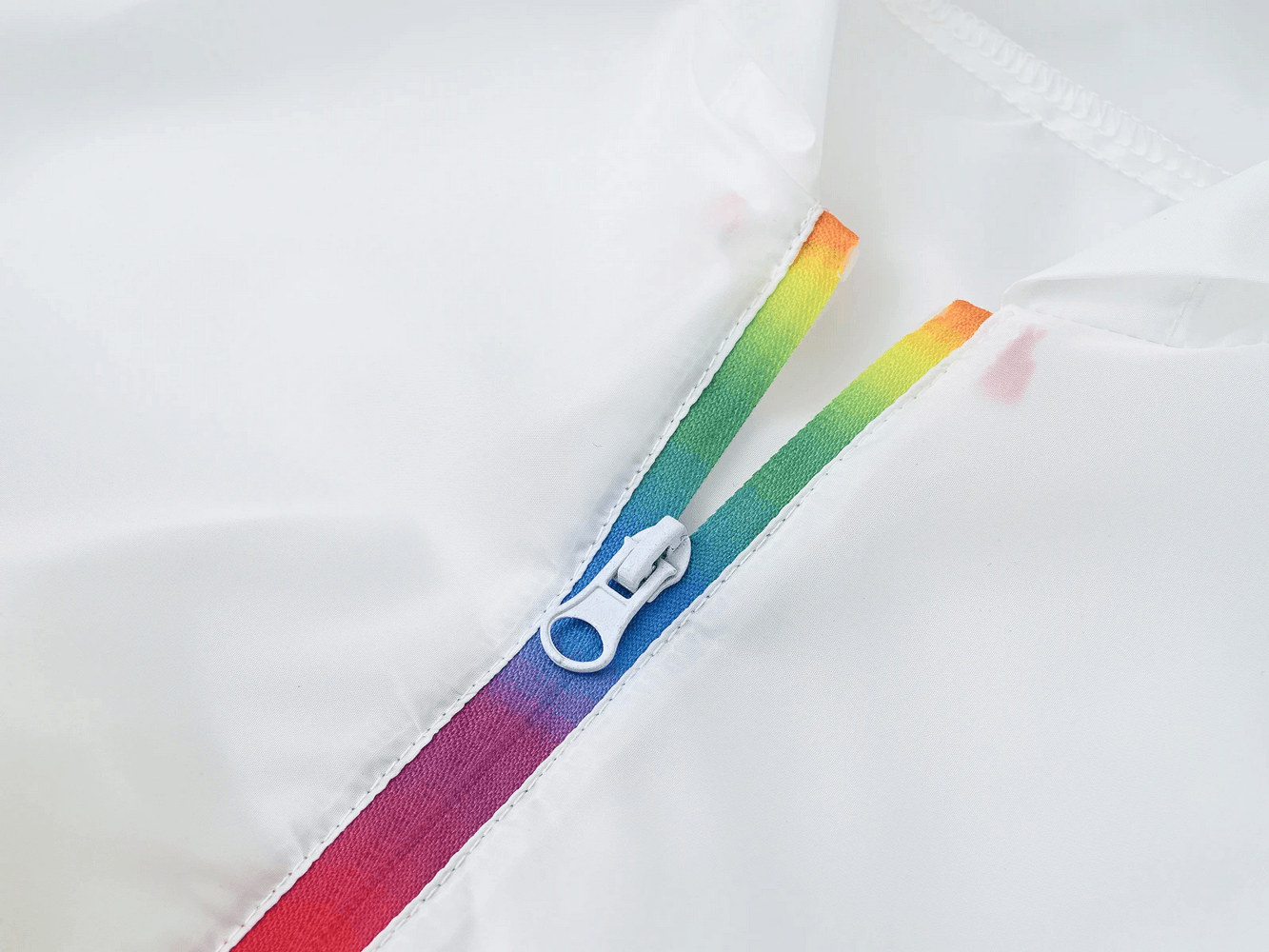 Close-up of Kids Gradient Hooded Windbreaker with Zipper - SF3652, featuring colorful gradient zip design and smooth fabric.