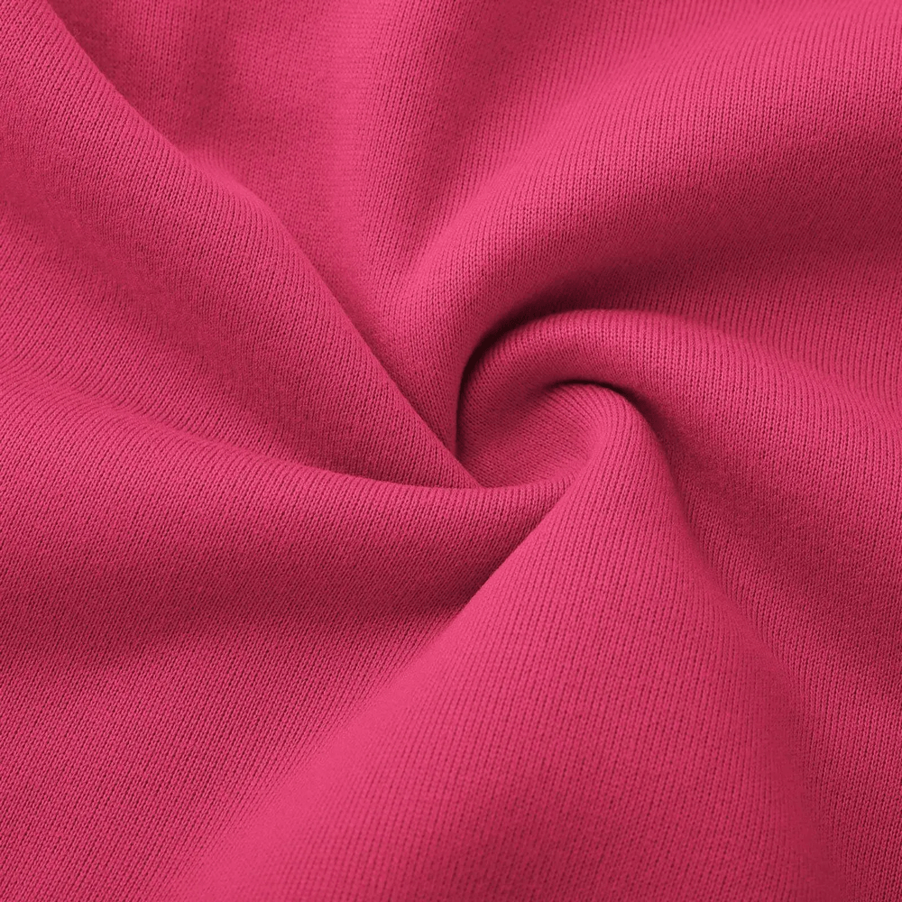 Close-up of pink fabric texture from Kids Half Zip Pullover Hoodie with Front Pocket - SF3885, showcasing soft material for children's comfort.