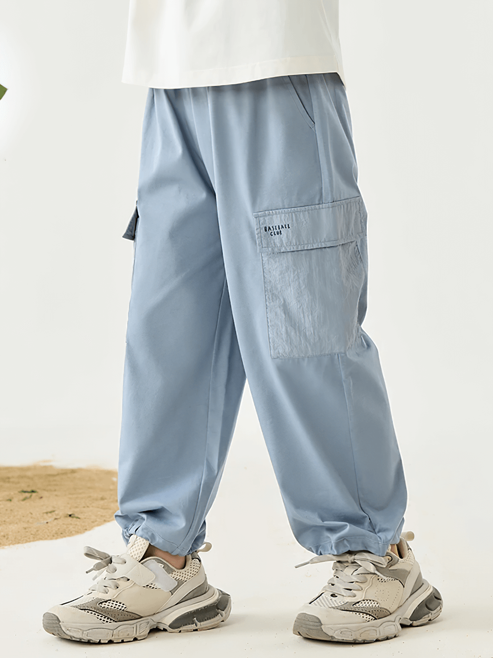 Kids Hiking Pants with Elastic Waist and Pockets - SF3802 in blue, featuring a loose fit and practical storage for outdoor fun.