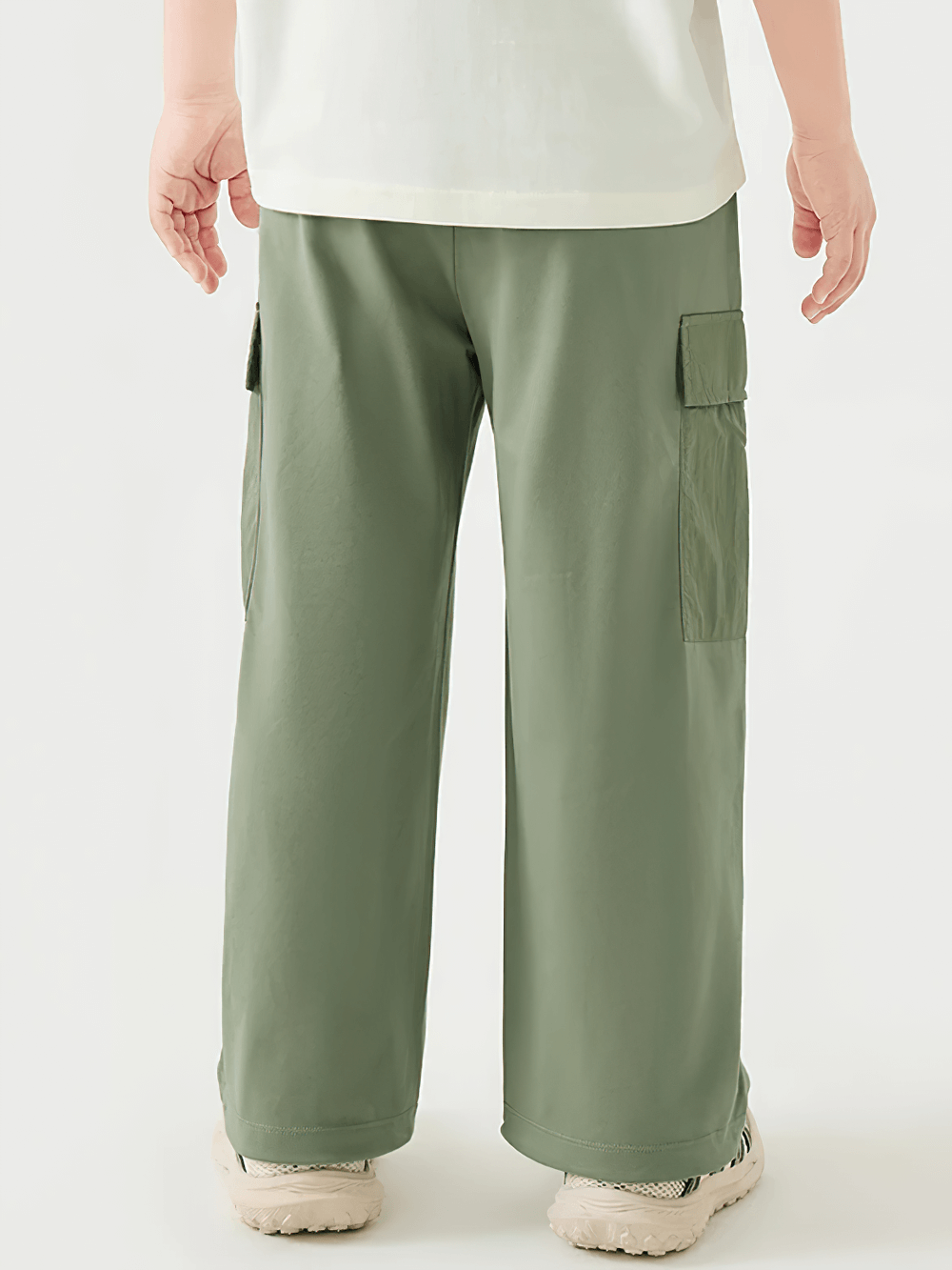 Back view of Kids Hiking Pants with Elastic Waist and Pockets - SF3802 in green, showcasing pockets and loose fit for outdoor fun.