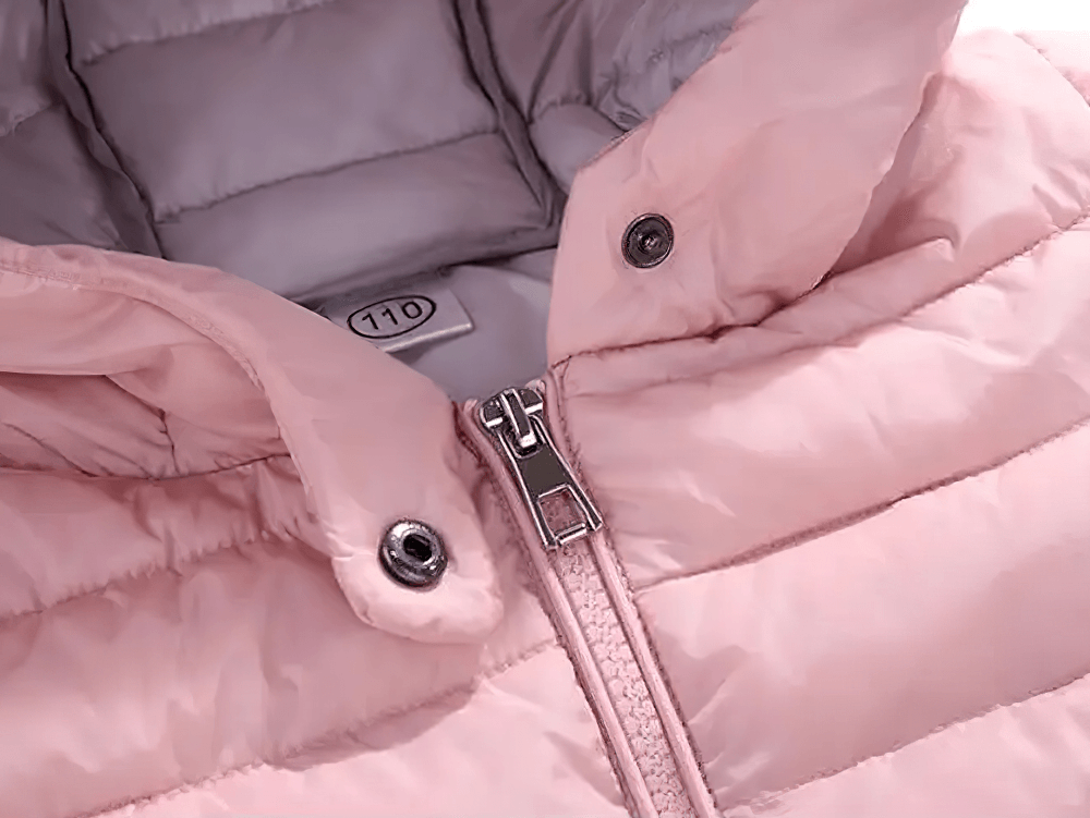 Close-up of Kids Hooded Cotton-Padded Long Warm Coat - SF3698 in soft pink, showcasing zipper and padded interior for warmth and comfort.