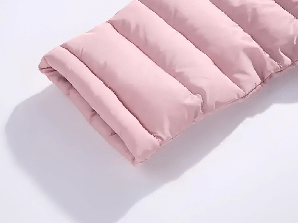 Close-up of Kids Hooded Cotton-Padded Long Warm Coat - SF3698 showing soft pink padding material