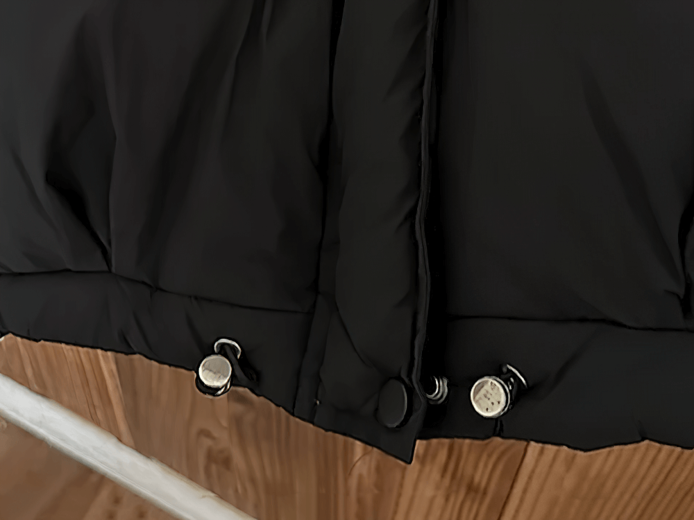 Close-up of buttons on Kids Hooded Down Jacket With Warm Thicken Padding - SF3809, highlighting sturdy design.