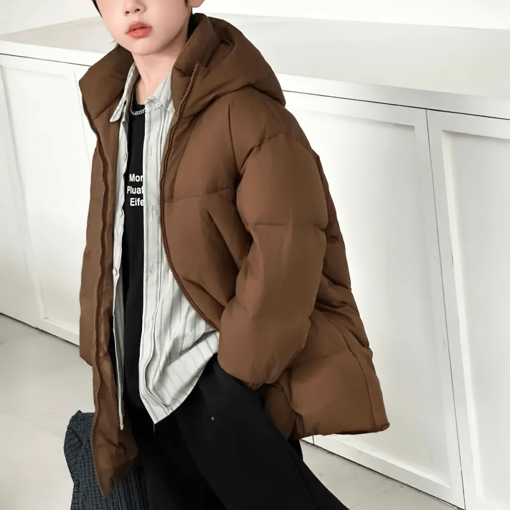 Young child wearing the Kids Hooded Down Warm Coat for Boys and Girls - SF3873, suitable for hiking and winter outdoor activities.