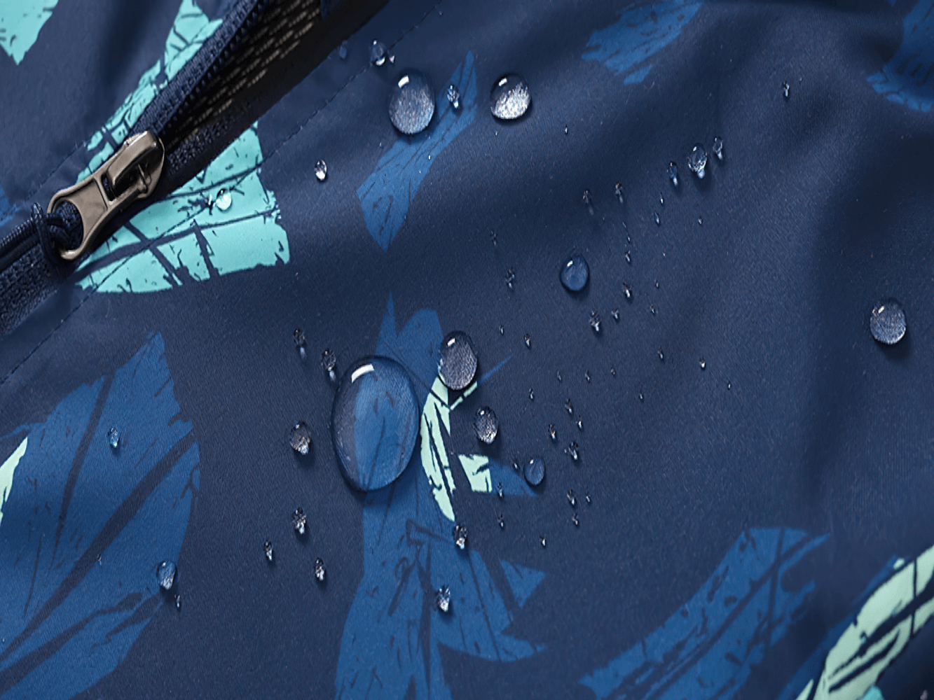 Close-up of waterproof fabric with feather print from Kids Hooded Jacket with Colorful Graffiti Print - SF3606.