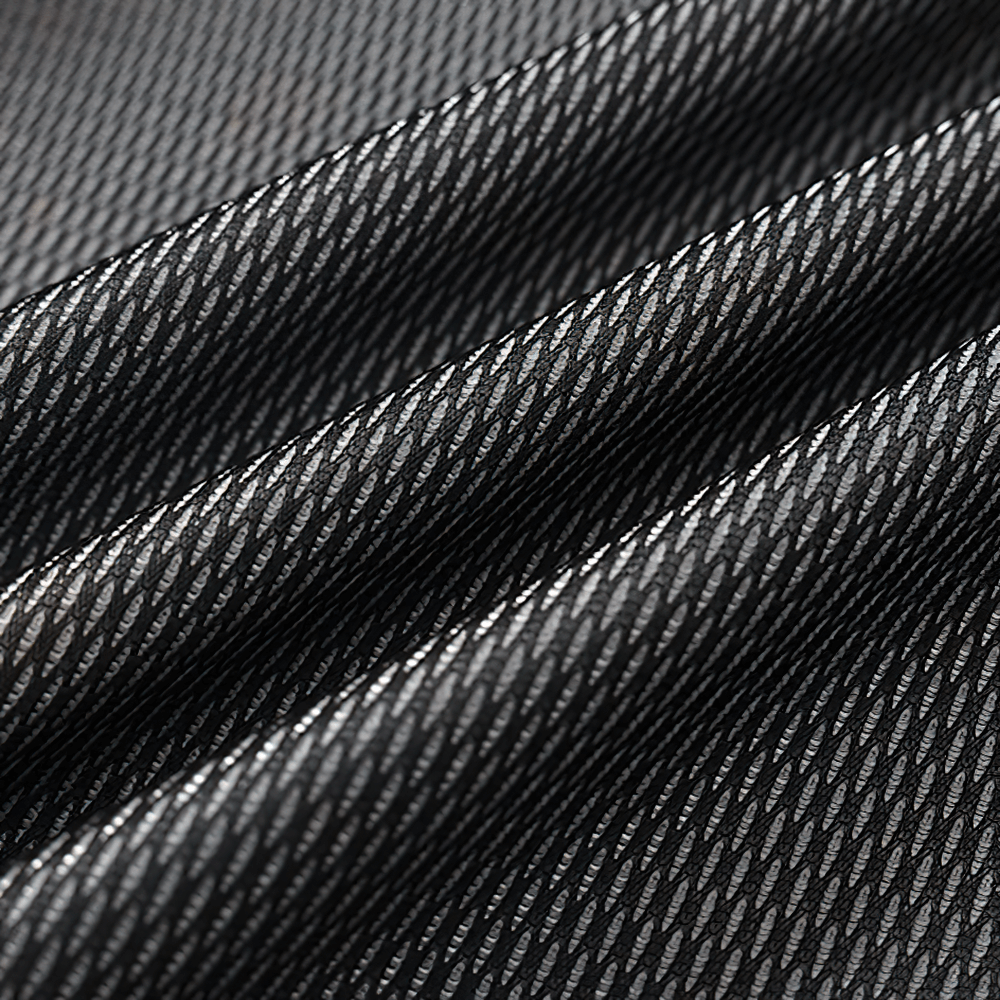 Detailed close-up of fabric texture for Kids Hooded Jacket with Colorful Graffiti Print - SF3606, highlighting the material's durability.