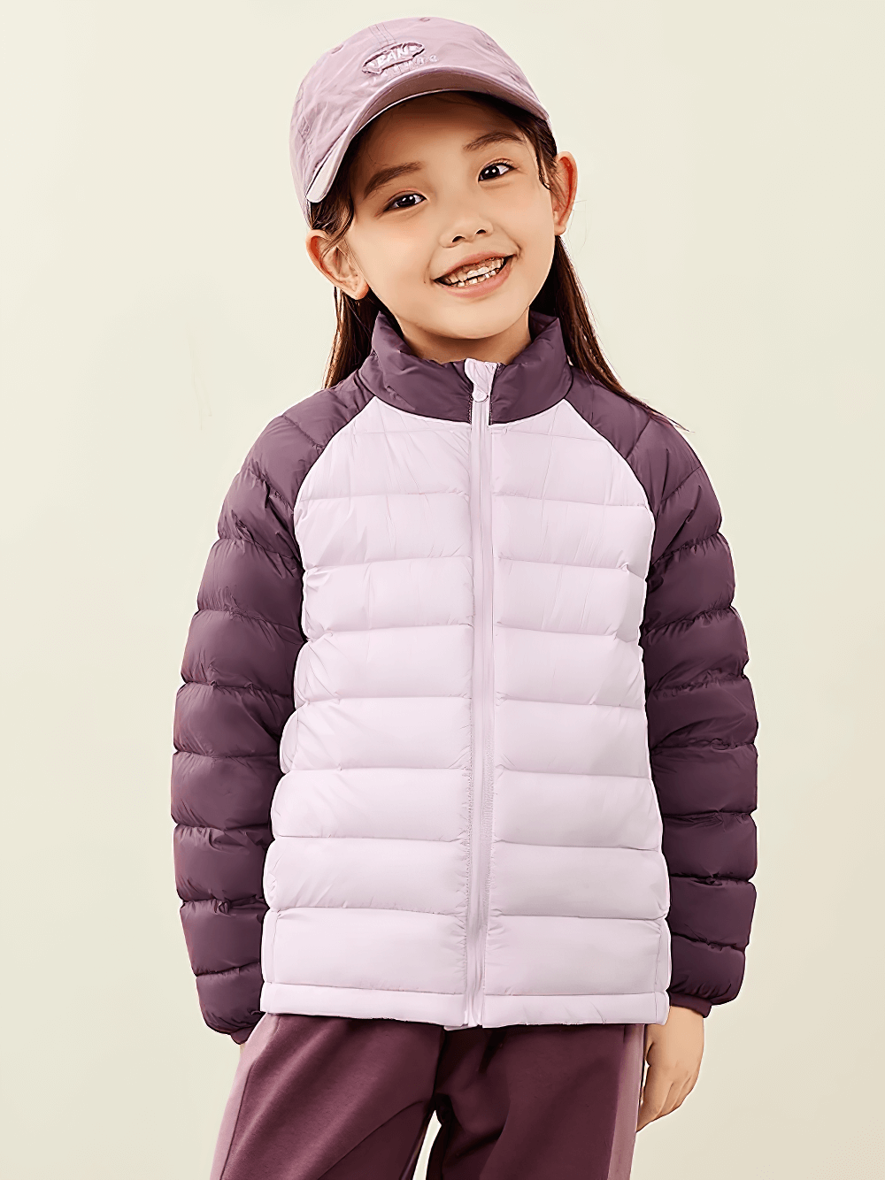 Smiling child wearing Kids Lightweight Jacket with Warm Quilted Design - SF3702, showcasing its insulated and stylish comfort.