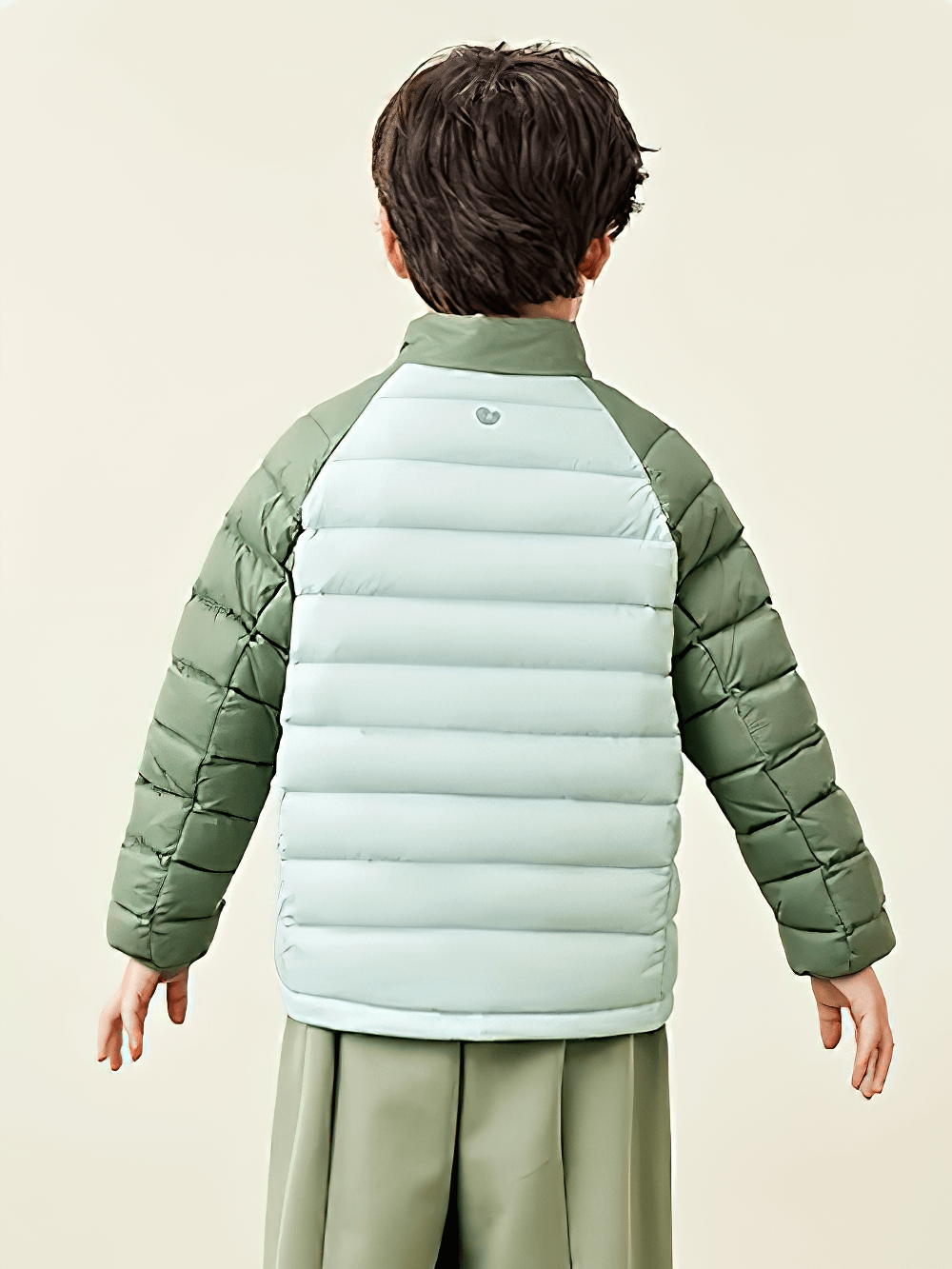 Back view of Kids Lightweight Jacket with Warm Quilted Design - SF3702 showcasing raglan sleeves in green.