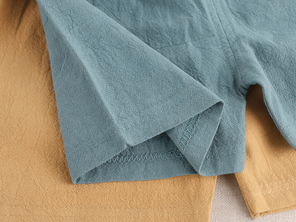 Detailed view of Kids Lightweight Shorts with Cute Patch Detail - SF3755 in blue and yellow with stripe trim.